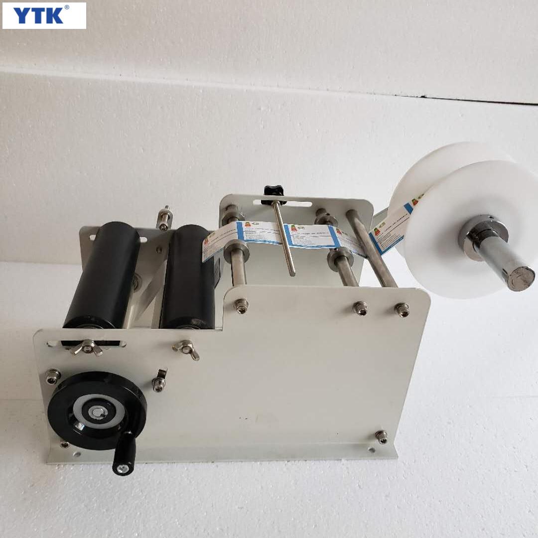 YTK-100 Manual Round Bottle Labeling Machine For Plastic Bottles